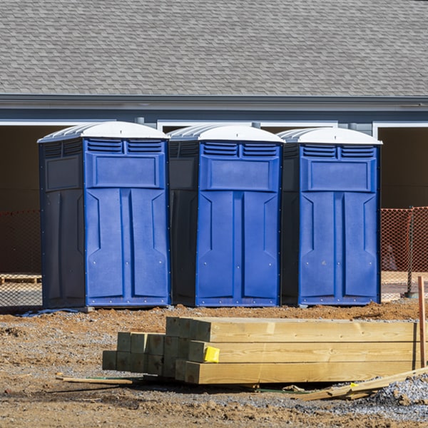 what is the maximum capacity for a single portable toilet in Wilmer
